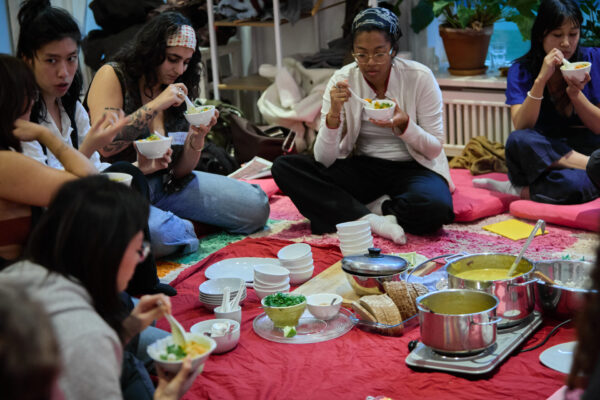 Two people sitting and eating