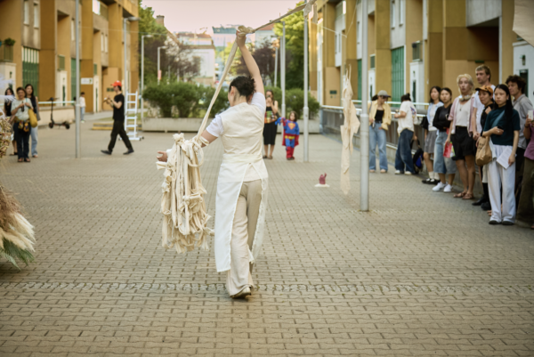 A performance of a woman with a crowd